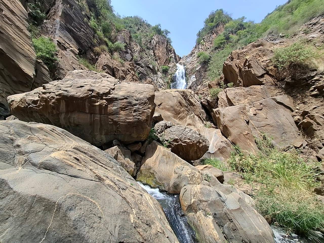 Waterfall dropping between sheer canyon walls in the Nguruman gorge